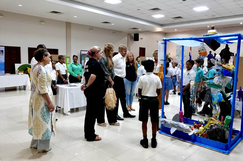 King Willem-Alexander, Queen Máxima and the Princess of Orange visit a science fair in St Maarten