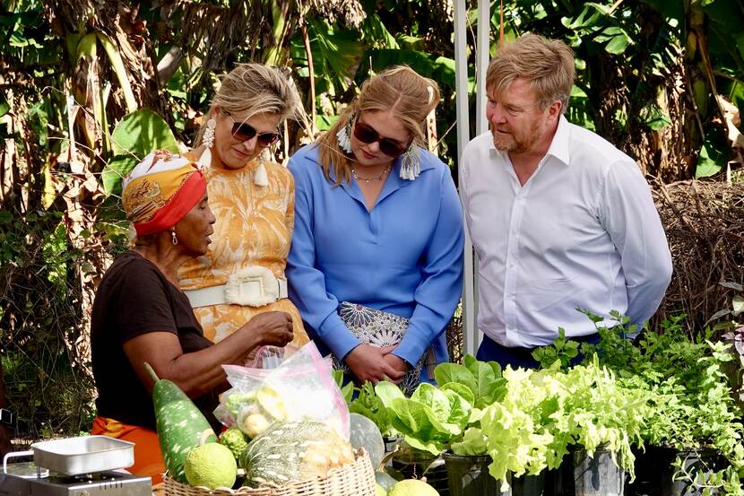 King Willem-Alexander, Queen Máxima and the Princess of Orange visit a community garden in St Eustatius