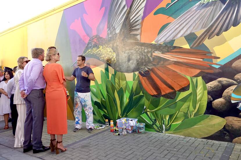 King Willem-Alexander, Queen Máxima and the Princess of Orange visit murals in Aruba