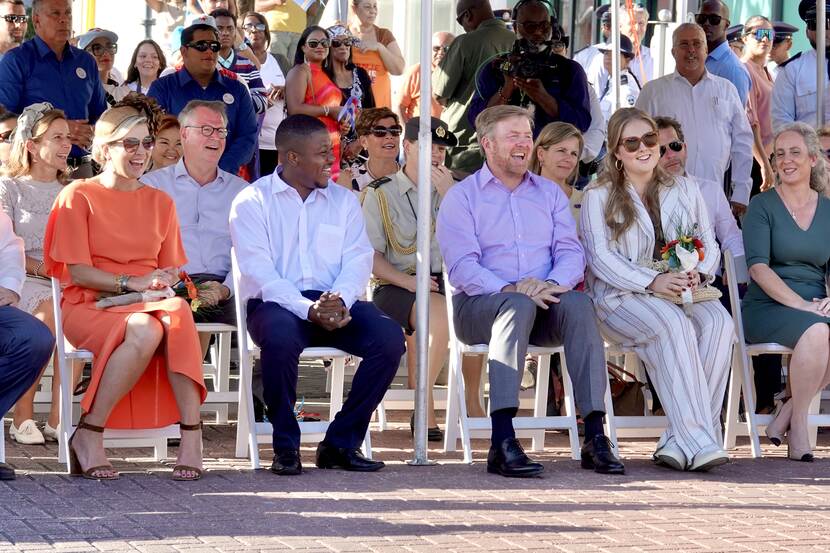 King Willem-Alexander, Queen Máxima and the Princess of Orange watch street performances in Aruba