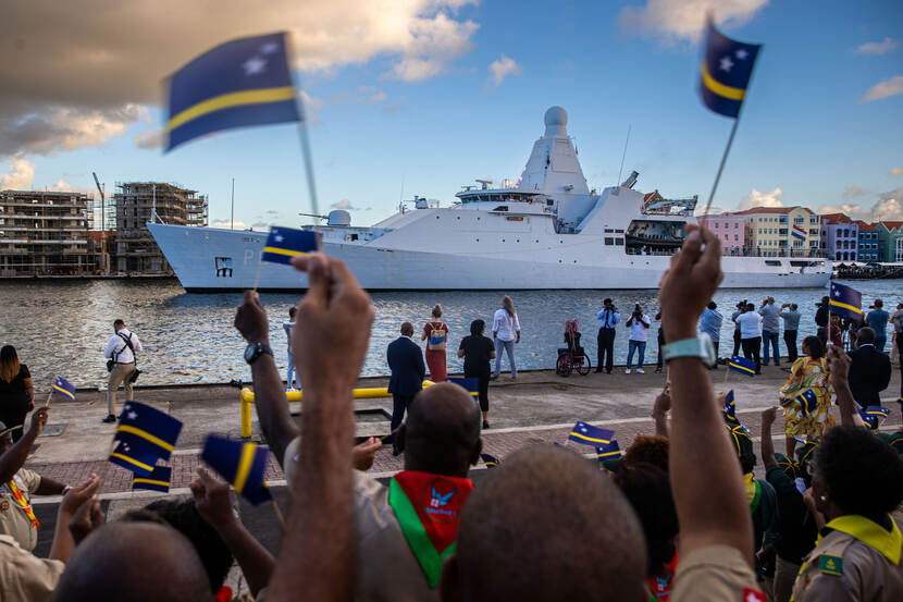 King Willem-Alexander, Queen Máxima and the Princess of Orange arrive at Curacao on patrol ship HNLMS Holland