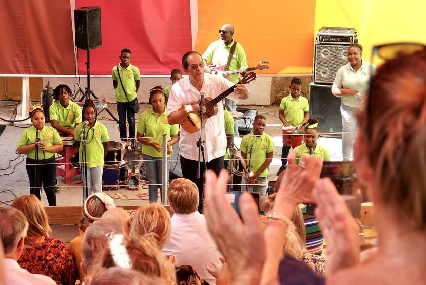 King Willem-Alexander, Queen Máxima and the Princess of Orange watch a musical performance in Otrobanda district in Curacao