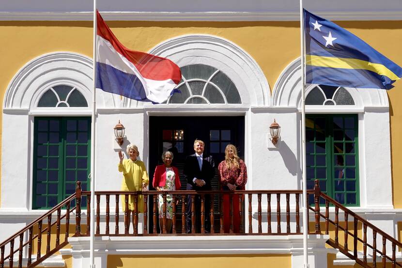 King Willem-Alexander, Queen Máxima and the Princess of Orange in front of the Governor’s Palace in Curacao