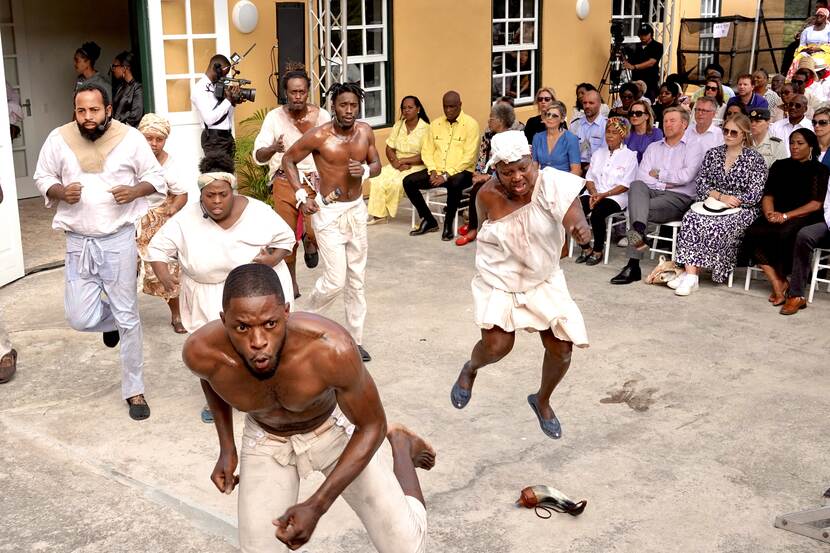 King Willem-Alexander, Queen Máxima and the Princess of Orange watch a performance at Tula Museum in Curacao