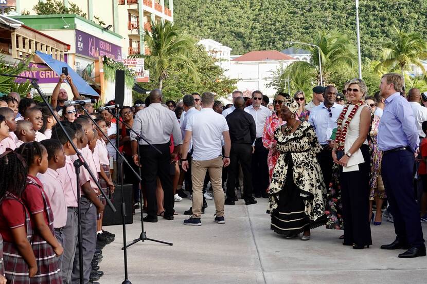 King Willem-Alexander, Queen Máxima and the Princess of Orange watch a performance on the Boardwalk in Philipsburg in St Maarten