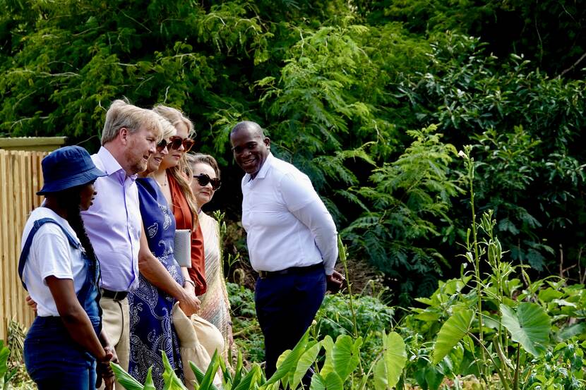 King Willem-Alexander, Queen Máxima and the Princess of Orange visit a school garden project in St Maarten