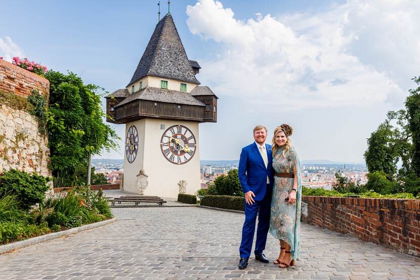King Willem-Alexander and Queen Máxima pose at the Uhrturm of the Schlossberg fortres