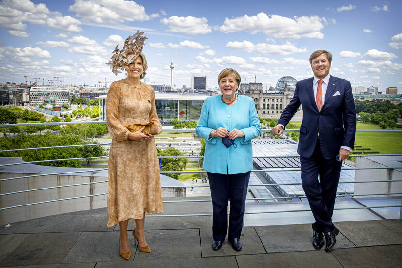King and Queen meet Angela Merkel