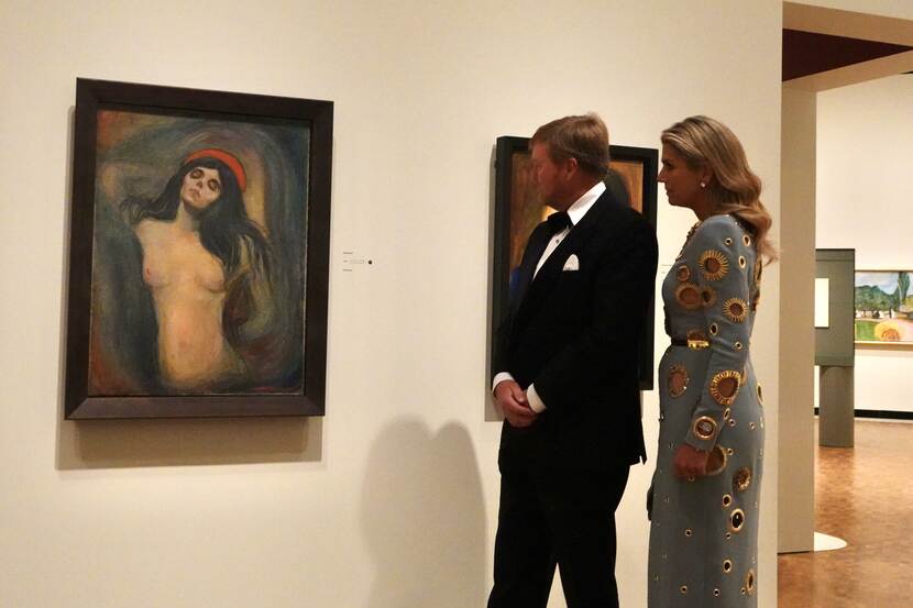 The Royal Couple looking at the painting 'Madonna' at the Munchmuseum.